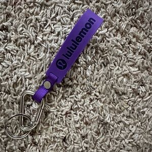 BRAND NEW Lululemon silicone key chain in purple